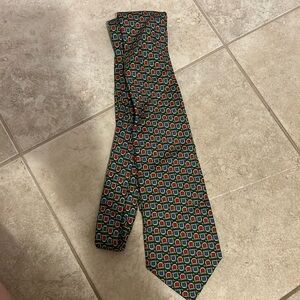 Vintage 100% silk neck tie, gold blue and red horseshoes